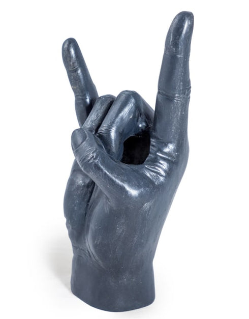 Large Black Rock On Hand