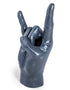 Large Black Rock On Hand