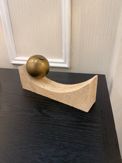 Curved Travertine With Brass Sphere