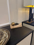 Curved Travertine With Brass Sphere