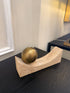 Curved Travertine With Brass Sphere